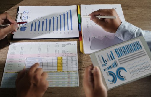 businessman-in-meeting-analysis-chart-graphyxa-analyzing-financial-document-graph-chart-strategy-analysis-financial-accounting.jpg