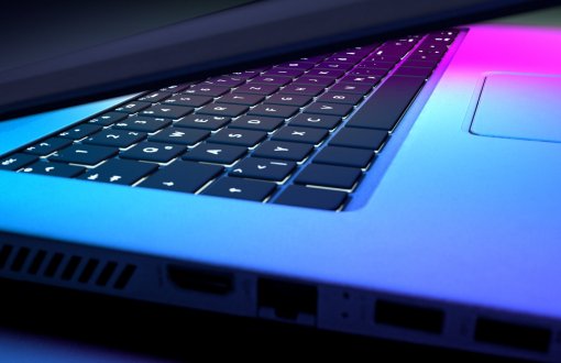 close-up-keyboard-laptop-with-blue-pink-lighting-technology-concept.jpg